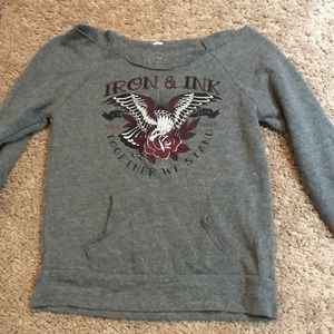 Off the shoulder long sleeve Iron and Ink shirt.